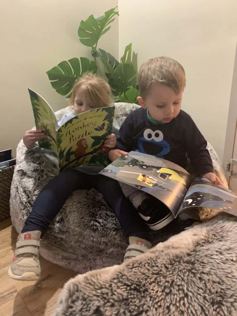 Enjoying their reading snug 